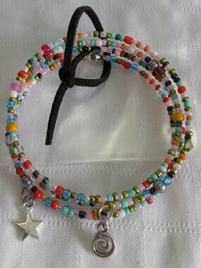 F - Handmade memory wire bracelets set with beads and pendants